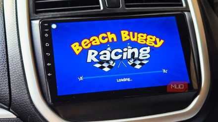 Beach Buggy Racing loading screen on a car's infotainment screen