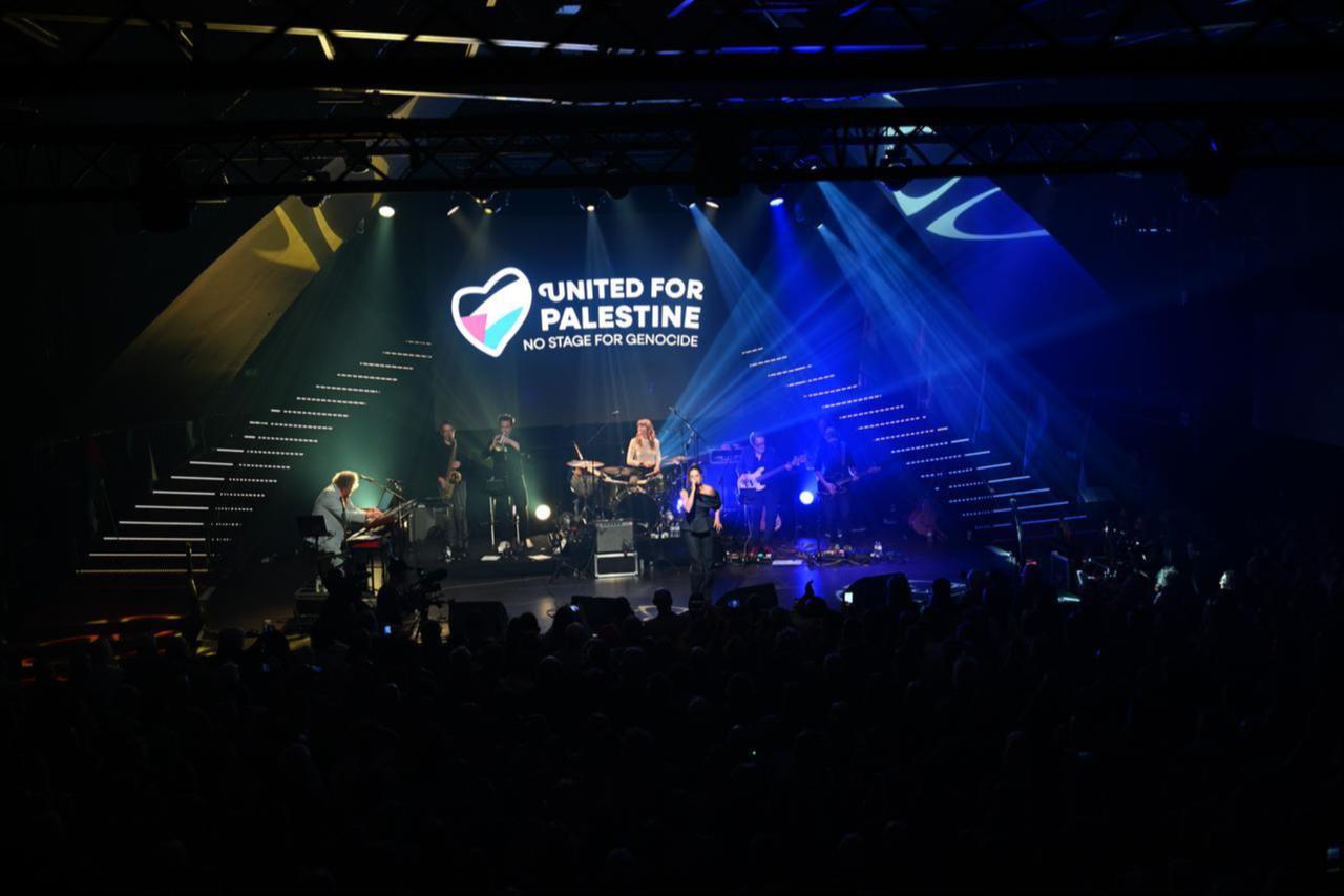 People attend an alternative concert titled