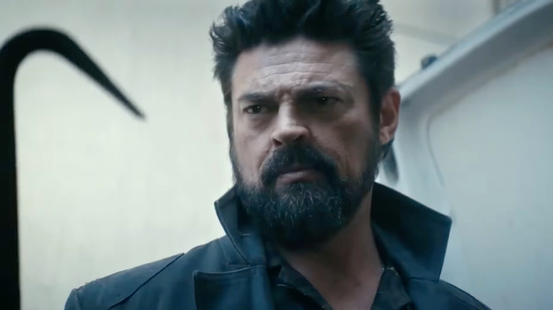 Billy Butcher (Karl Urban) looking at a hook on 