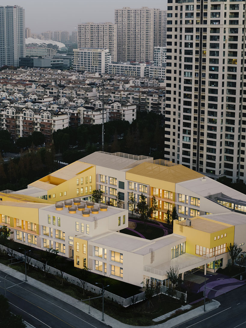 stacked color blocks and layered courtyards form a modular castle-like kindergarten in china - 3