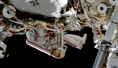 Roscosmos cosmonaut Sergey Ku-Sverchkov installs a solar radiation experiment during a spacewalk on the outside of the International Space Station.