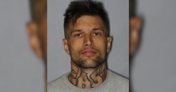 Police search for 'dangerous' man over release conditions breach