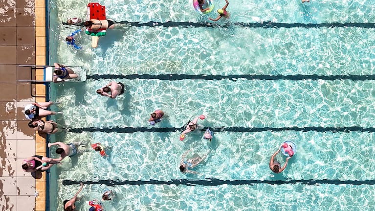 wimmers keep cool in an open-air pool in Letchworth Garden City, Hertfordshire, England.