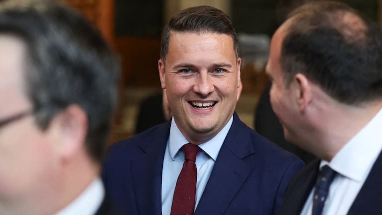 British Health Secretary Wes Streeting walks through the House of Commons to attend the State Opening of Parliament at the Palace of Westminster, London, Wednesday, May 13, 2026.
