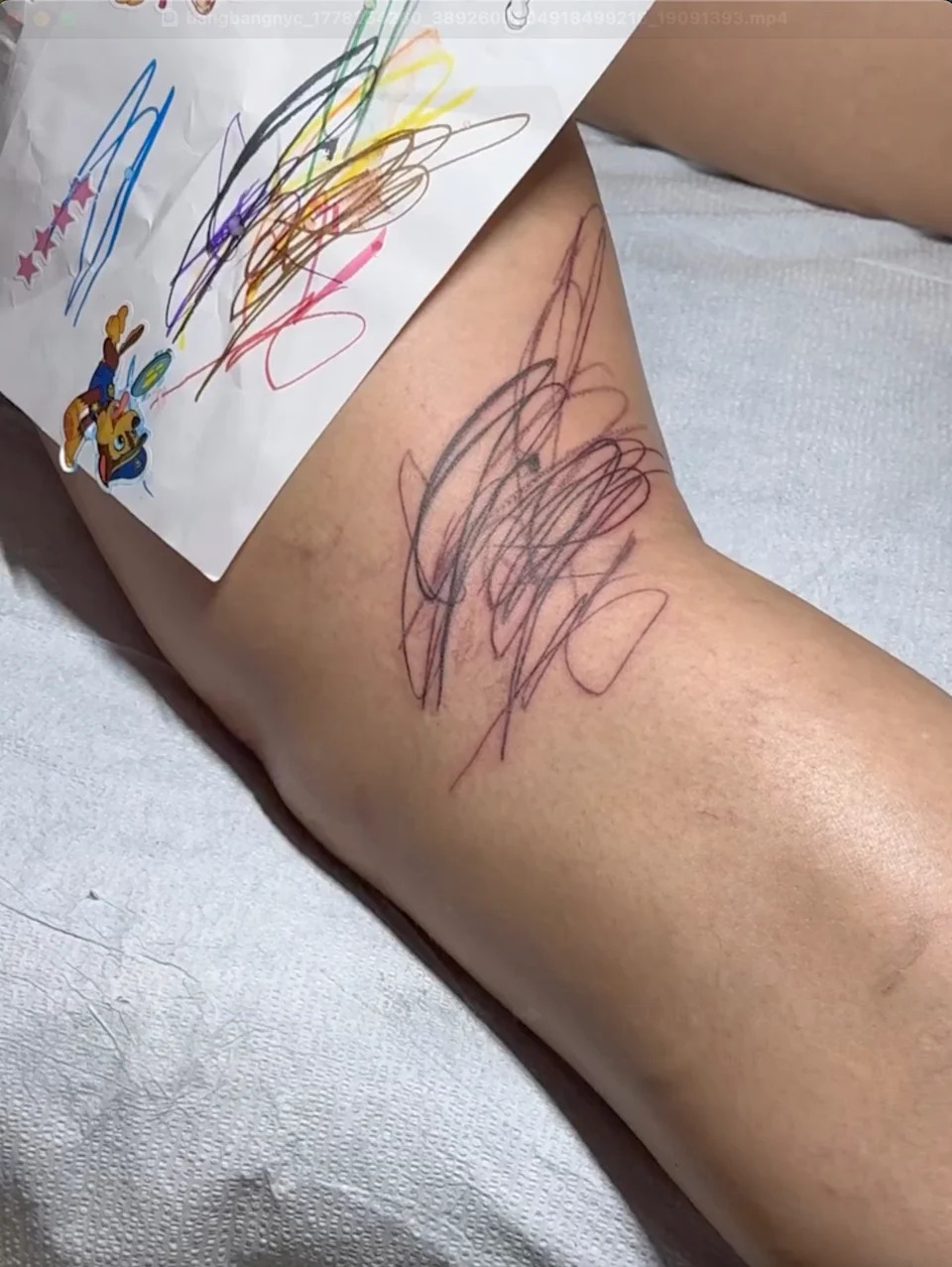 Rihanna’s latest tattoo (seen above) was designed by her kids, celeb tattoo artist Bang Bang revealed via Instagram. bangbangnyc/ instagram