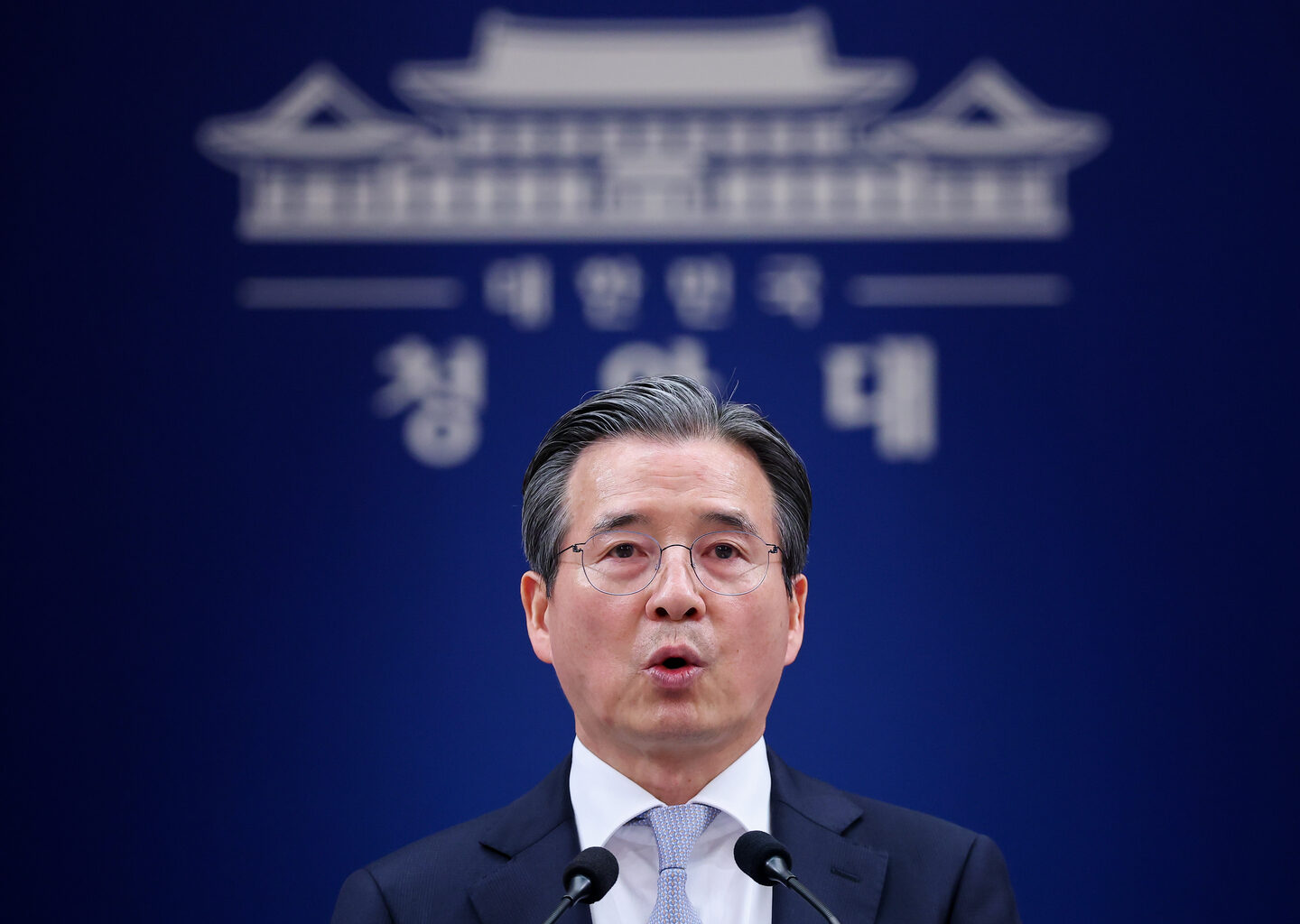 Presidential office policy chief Kim Yong-beom briefs reporters at the Blue House on April 27 regarding President Lee Jae Myung