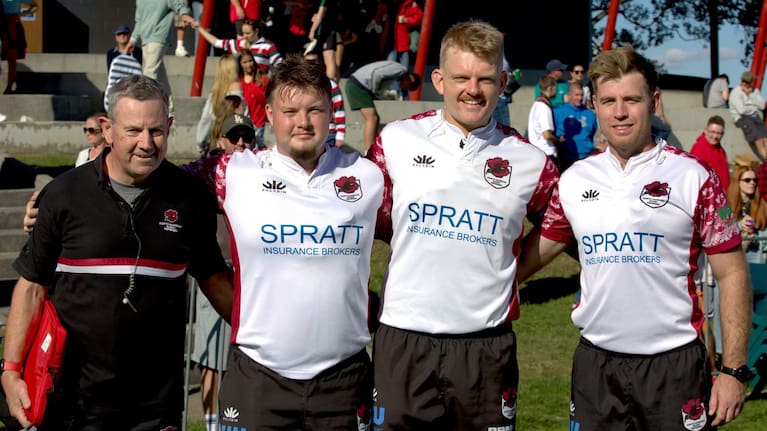 Caleb Greaves, second from left at a game. 