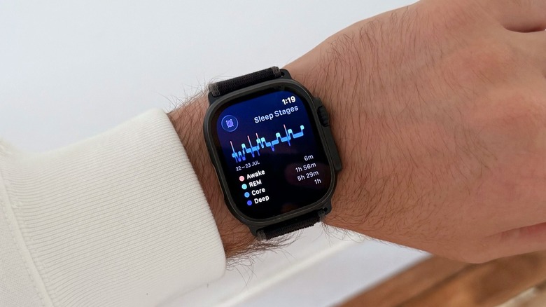 A man's wrist with an Apple Watch Ultra on displaying Sleep Stages feature