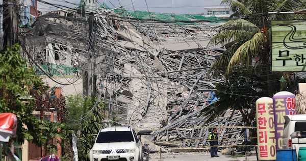 Dozens believed trapped as nine-storey building collapses in Philippines