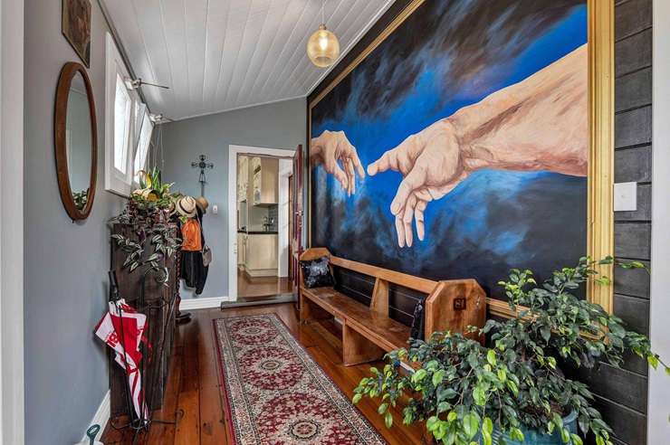 Janine and Brian Jones sold their colourful home for over $545,000 after five years of renovation and restoration work. Photo / Supplied