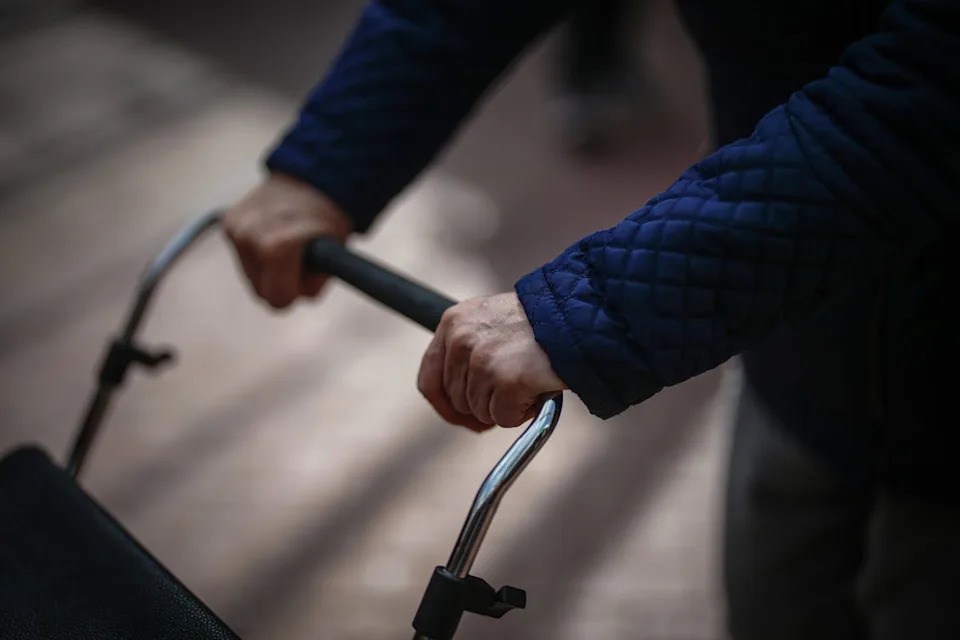 Senior citizen wraps up warm to do her shopping (Getty Images)