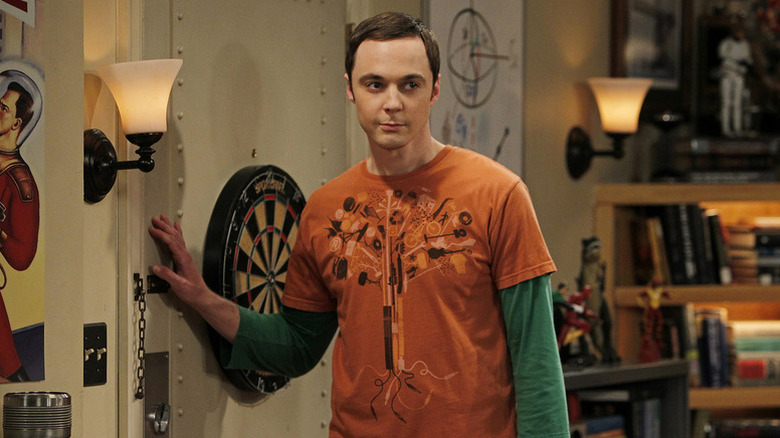 Sheldon Cooper (Jim Parsons) touching his apartment door on 