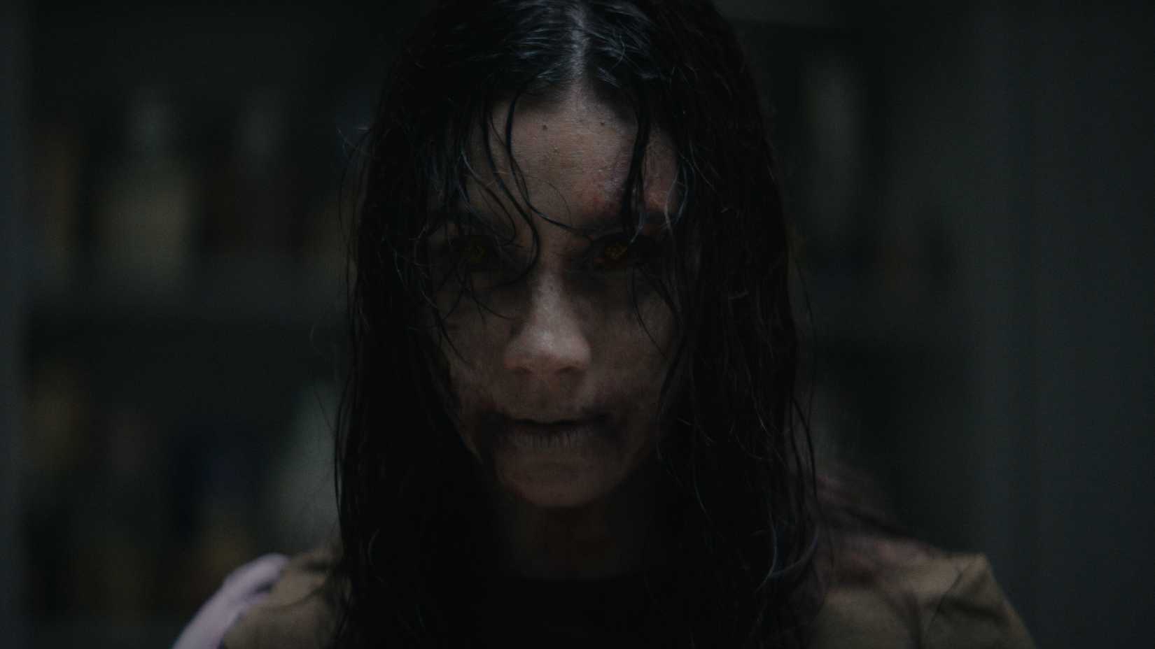 close up of a deadite's face in evil dead burn-1
