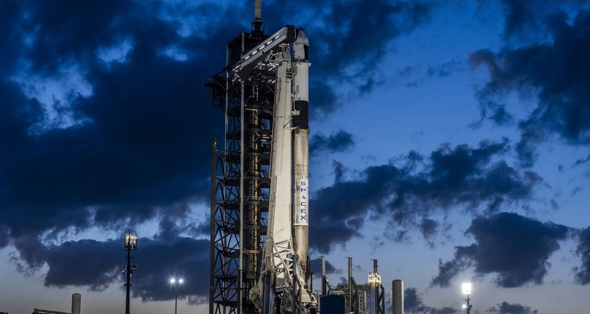 A SpaceX Falcon 9 rocket, with the company’s Dragon spacecraft atop, stands in a vertical position at Launch Complex 39A at NASA’s Kennedy Space Center in Florida on Monday, April 21, in preparation for the 32nd commercial resupply services launch to the International Space Station.