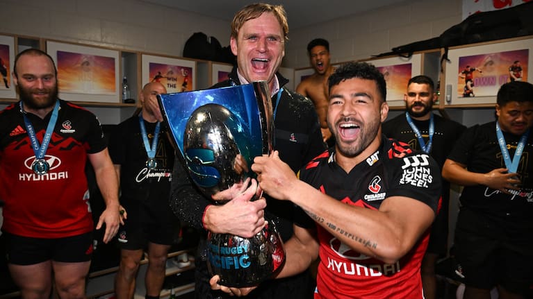 Scott Robertson and Richie Mo'unga celebrate beating the Chiefs in the 2023 Super Rugby grand final.