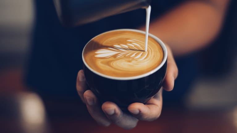 A barista making a cup of coffee (file image).