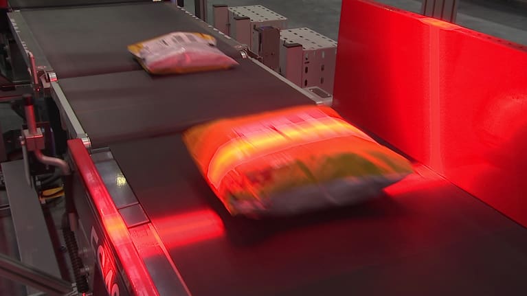 The facility's parcel-sorting conveyor belt system could process up to 6500 inbound parcels per hour and 5600 outbound.