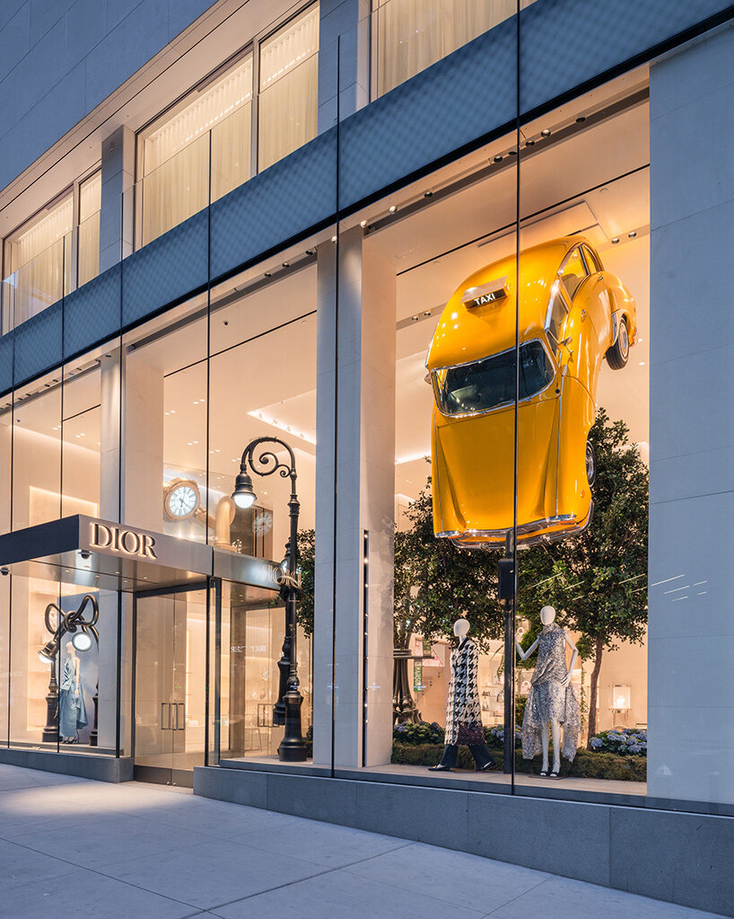 alex chinneck twists NYC taxis and LA cars into storefront sculptures for dior - 2