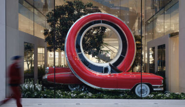 alex chinneck twists NYC taxis and LA cars into storefront sculptures for dior