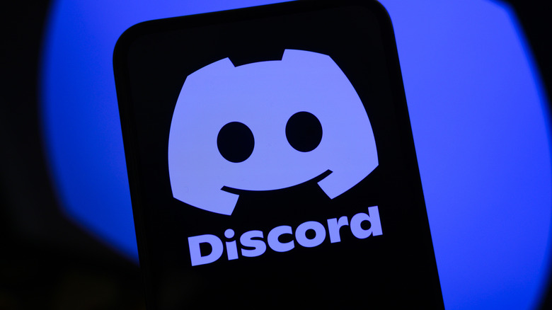 The Discord logo on a smartphone