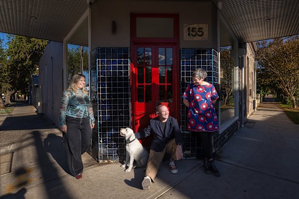 Make Projects designer Jos Tarr with Mackenzie Pronk Architects co-founders Neil Mackenzie and Heidi Pronk and groodle Milo outside Crossroads, an office and apartment project shortlisted for residential alterations and additions.