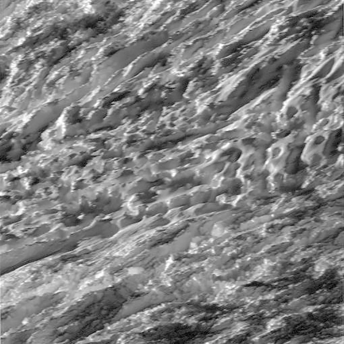 A close-up view of Enceladus captured by the Cassini spacecraft during its closest dive past Saturn's icy moon. Credit: NASA