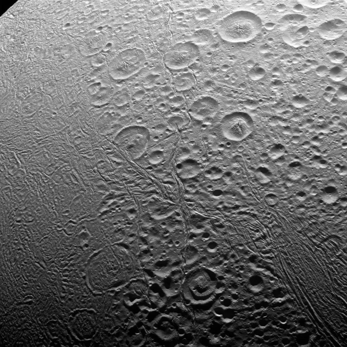 The heavily-cratered north pole of Enceladus. Credit: NASA/JPL/Caltech