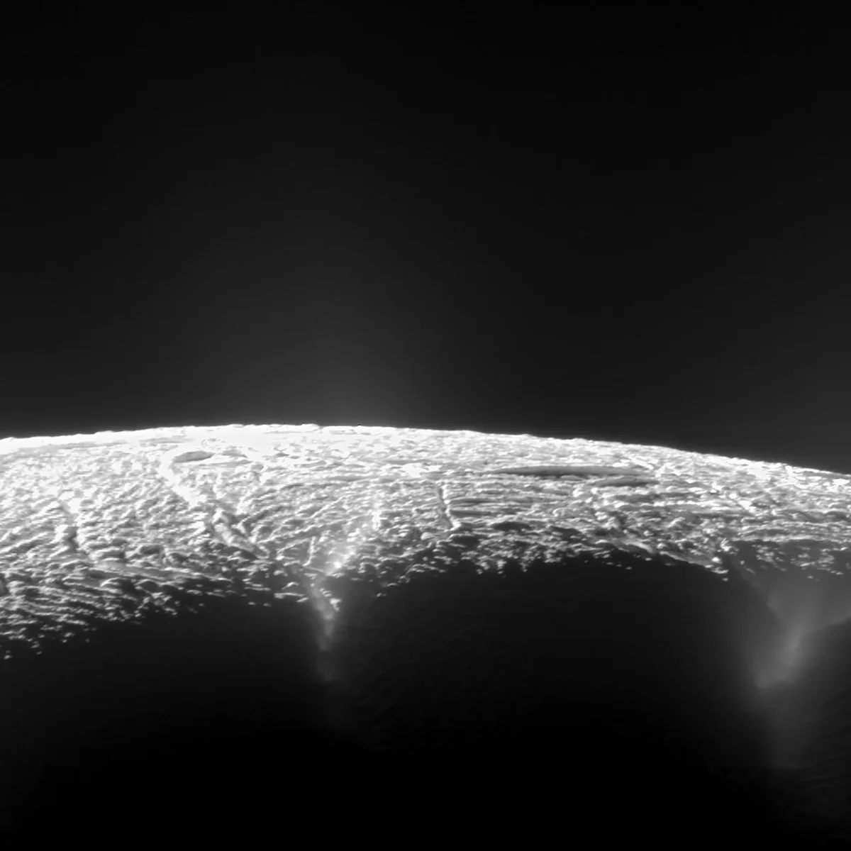 An elevated view of Enceladus's south pole, as seen by the Cassini spacecraft. The view looks across the region of Enceladus' geyser basin and down on the ends of the Baghdad and Damascus fractures. Credit: NASA