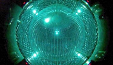 Visualization of an eta prime meson interacting inside an atomic nucleus during a particle physics experiment