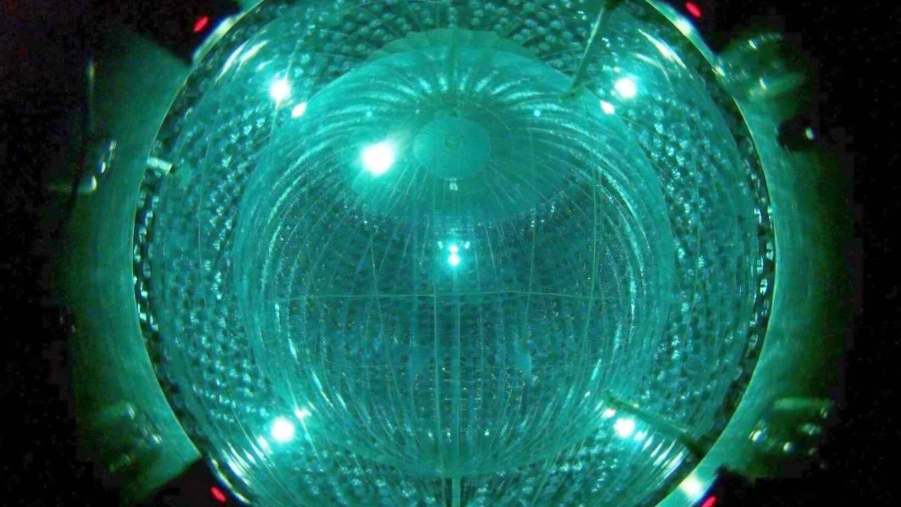 Visualization of an eta prime meson interacting inside an atomic nucleus during a particle physics experiment