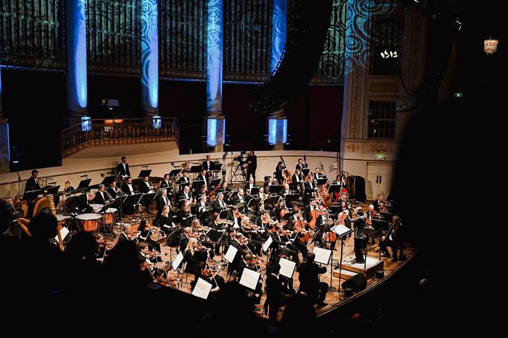 The Vienna Symphony Orchestra reinterprets hit songs by EXO, Red Velvet, NCT and aespa with full orchestral arrangements during its 'Wiener Symphoniker X K-Pop' concert held in Vienna, Feb. 16, bringing SM Entertainment's IP into the realm of classical music. Courtesy of SM Entertainment
