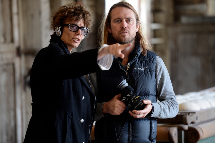 Rachel Ward and a colleague on set directing film action
