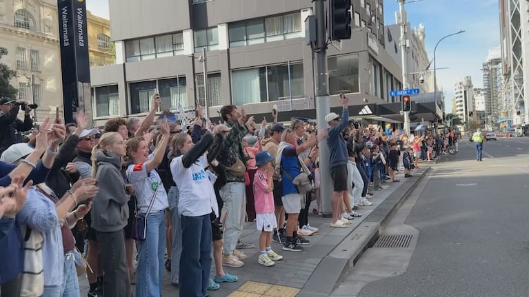 Fans line up in Commercial Bay to celebrate Auckland FC win.