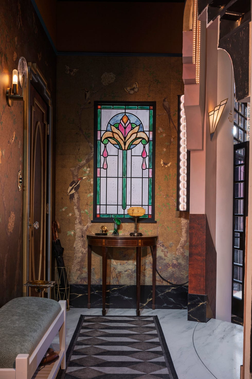Entryway with stained glass window and vintage decor. Entryway with stained glass window and vintage decor.