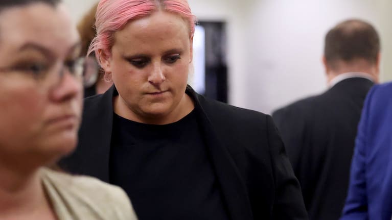 Maitlyn Gandy, Athena Strand's mother, leaves the courtroom following closing arguments in the punishment phase of Tanner Horner's capital murder trial