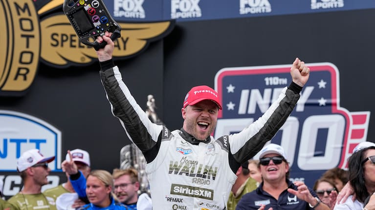 Felix Rosenqvist, center, of Sweden, celebrates after winning the Indianapolis 500 auto race at Indianapolis Motor Speedway in Indianapolis, Sunday, May 24, 2026.