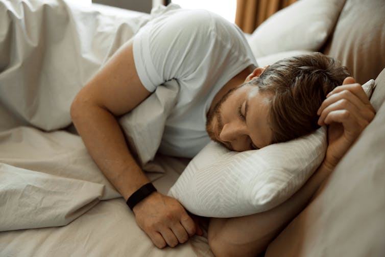 A man sleeping in bed
