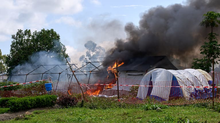 Flames and smoke rise from an Ebola treatment centre in the Congo.