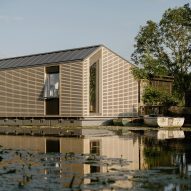 Timber-clad corner of Float House by TiggColl