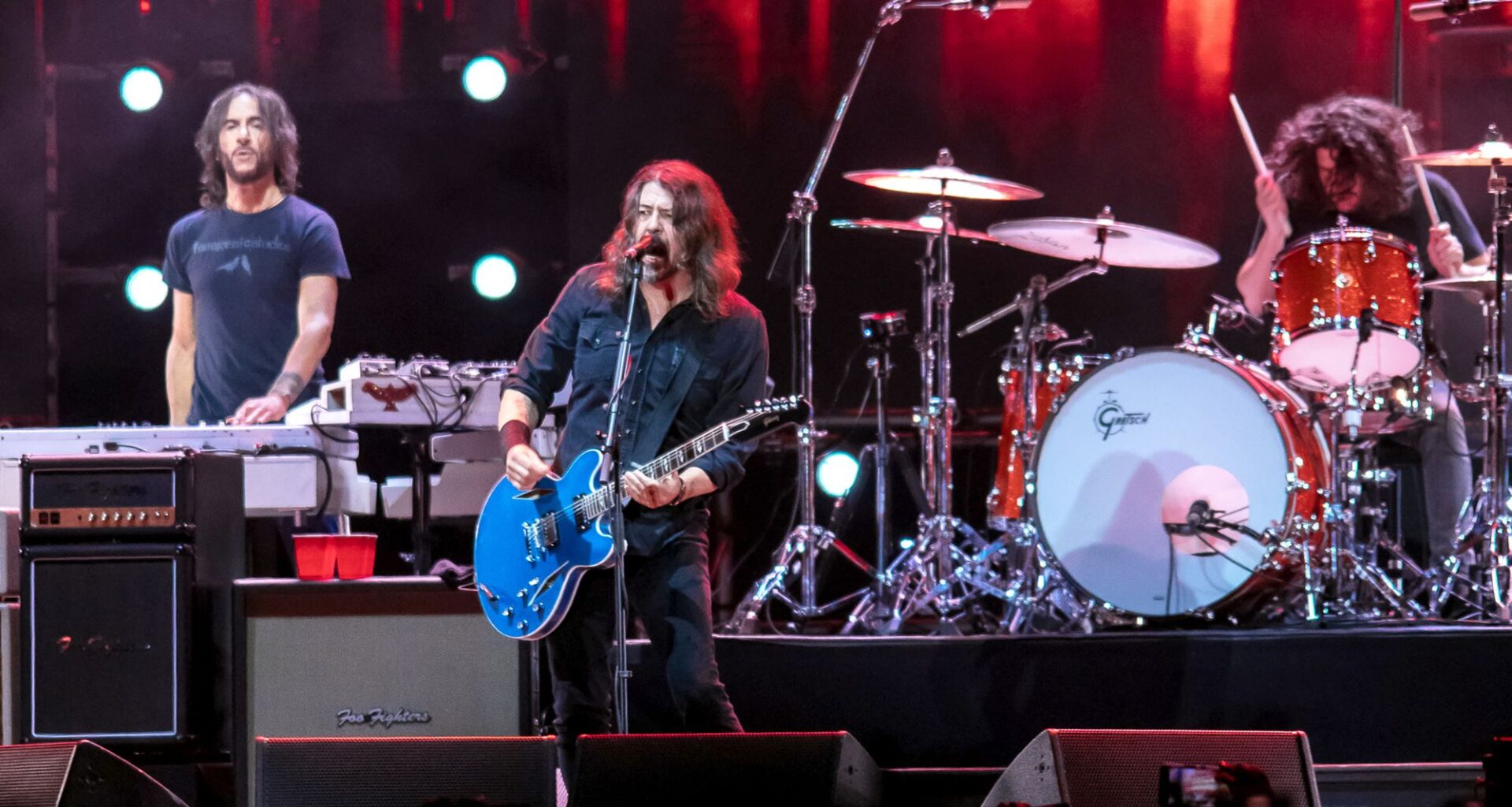 Watch Foo Fighters endure spicy wings and reveal "cringiest lyrics" on ‘Hot Ones Versus’