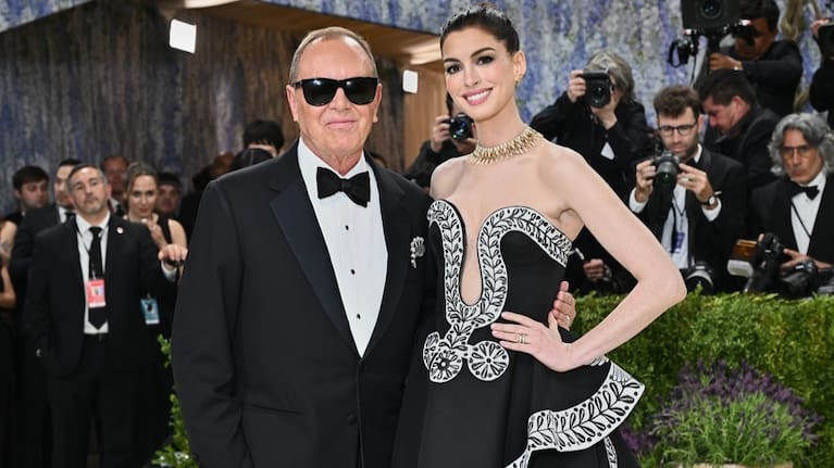From left, Michael Kors and Anne Hathaway arrive at The Metropolitan Museum of Art's Costume Institute benefit gala. (Source: Invision / AP)