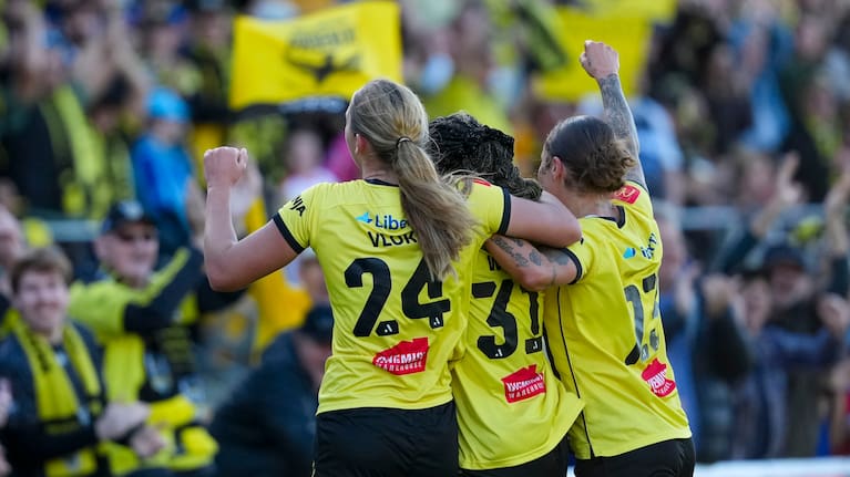 From left: Phoenix player Pia Vlok, Makala Woods and Brooke Nunn celebrate a goal during the A-League Women’s Semi Final leg 2 - Wellington Phoenix v Brisbane Roar at Porirua Park, on the 10 May 2026.