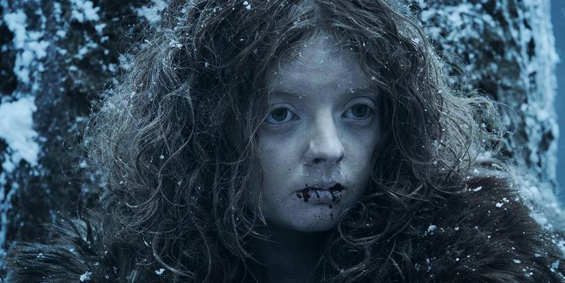 A little girl in the winter woods in Game of Thrones