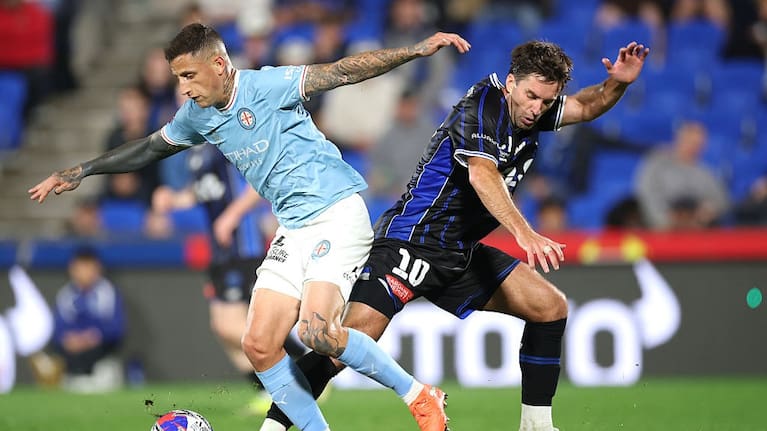 German Ferreyra of Melbourne City FC is tackled by Guillermo May of Auckland FC during the A-League Men Elimination Final match