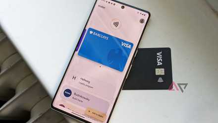 Google Wallet open on a Google Pixel phone resting on top of a black Visa card