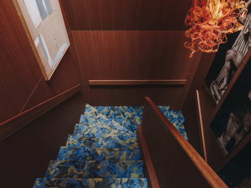 Blue-carpeted staircase