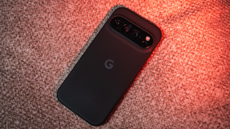 Pixel 10 Pro smartphone on a textured cloth surface