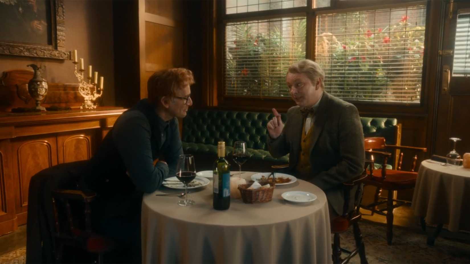 Human Crowley and Aziraphale at a restaurant in the Good Omens finale season 3