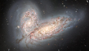 This image from the Gemini North telescope shows a pair of interacting spiral galaxies: NGC 4568 (bottom) and NGC 4567 (top). Image credit: International Gemini Observatory / NOIRLab / NSF / AURA / T.A. Rector, University of Alaska Anchorage & NSF’s NOIRLab / J. Miller, Gemini Observatory & NSF’s NOIRLab / M. Zamani, NSF’s NOIRLab / D. de Martin, NSF’s NOIRLab.