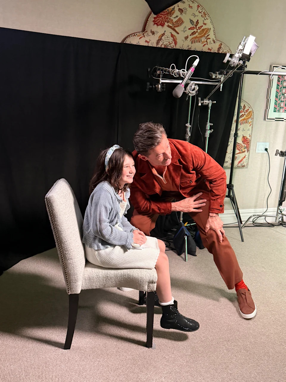 Hugh Jackman next to a girl